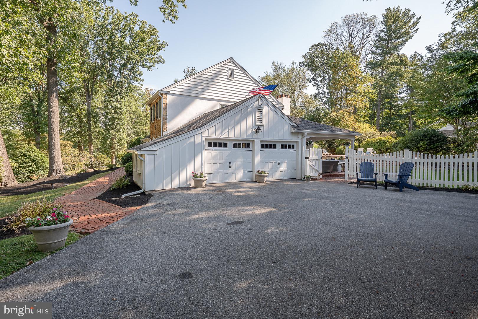 395 Bair Road Berwyn, PA 19312 - Photo 5 of 51 a view of a house with a yard and garage