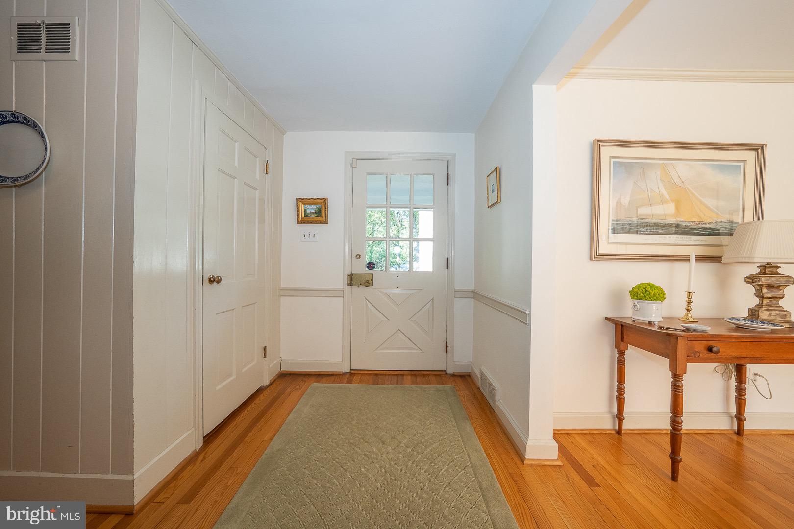 395 Bair Road Berwyn, PA 19312 - Photo 7 of 51 Foyer with Hardwood Floors and Chair rail