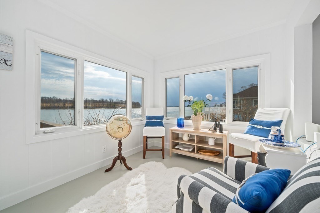 121 Edgewater Road Hull, MA 02045 - Photo 18 of 42 a living room with furniture and a window