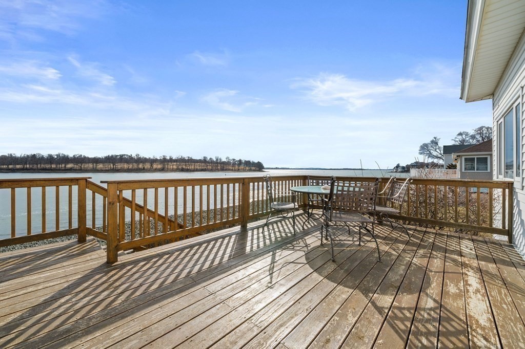 121 Edgewater Road Hull, MA 02045 - Photo 20 of 42 a view of balcony with wooden floor & fence