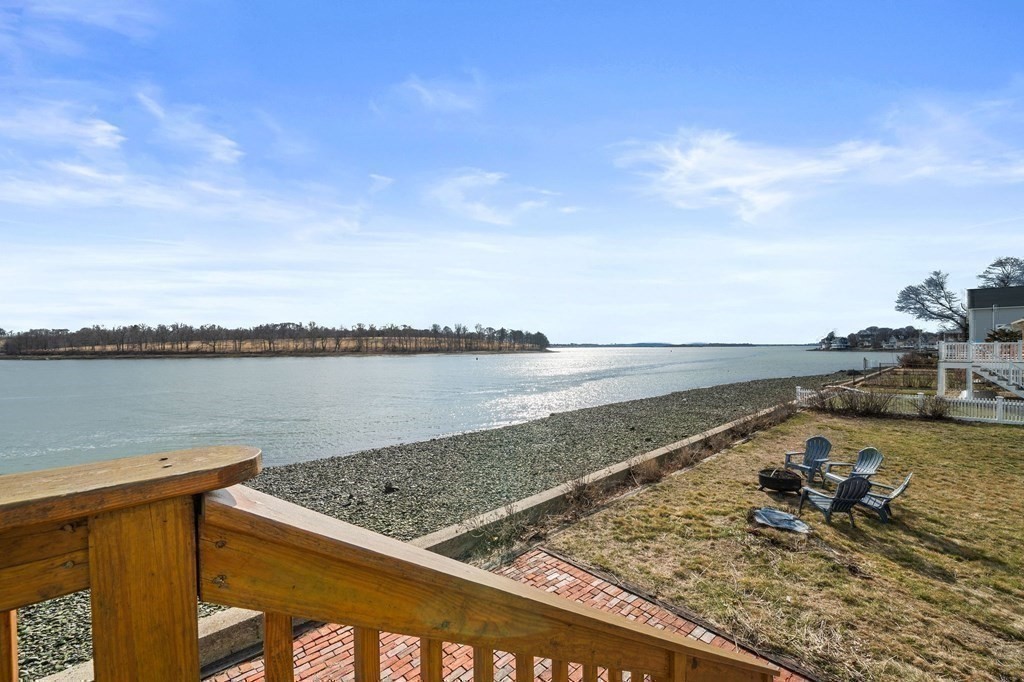 121 Edgewater Road Hull, MA 02045 - Photo 27 of 42 a view of a lake with a terrace