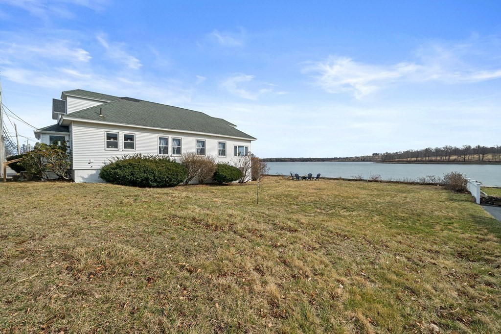 121 Edgewater Road Hull, MA 02045 - Photo 32 of 42 a front view of a house with a yard