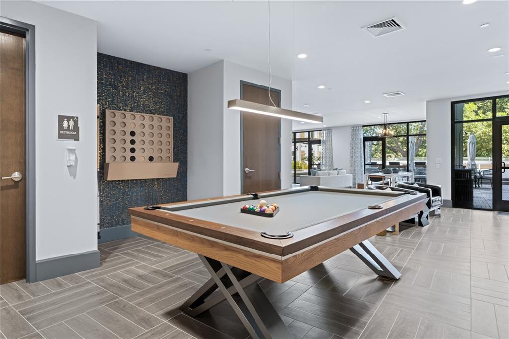 775 Juniper Street Northeast, Unit 227 Atlanta, GA 30308 - Photo 28 of 42 a room with pool table and glass door