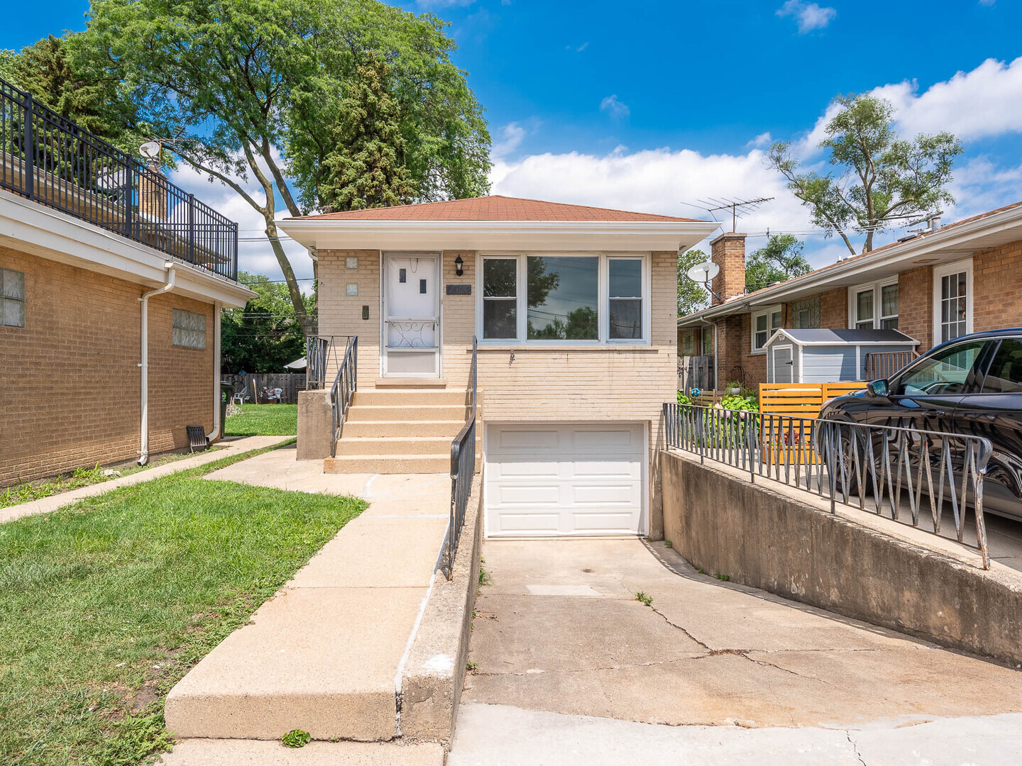 2304 Oakton Street Park Ridge, IL 60068 - Photo 1 of 14 a front view of a house with a yard