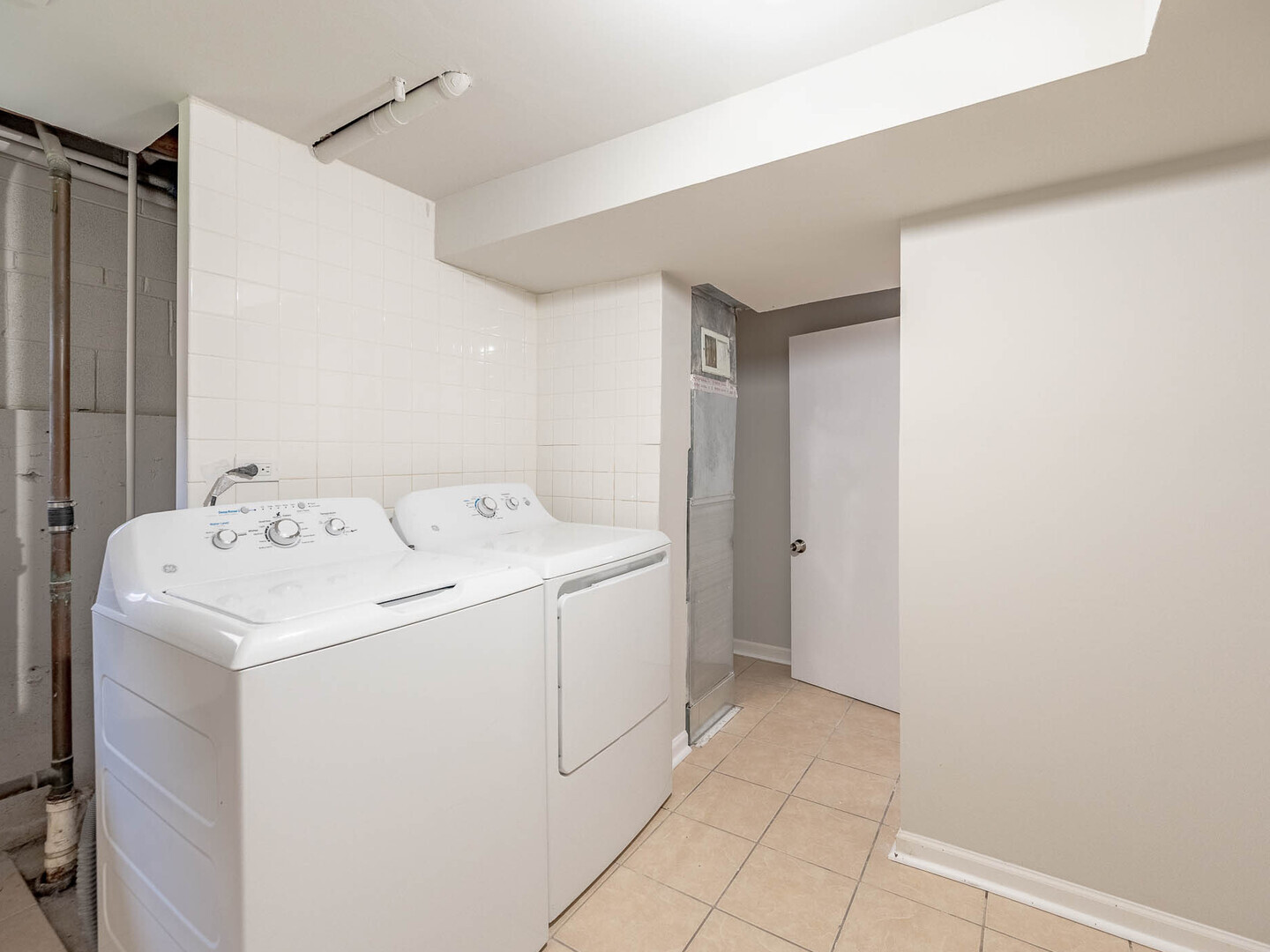2304 Oakton Street Park Ridge, IL 60068 - Photo 12 of 14 a utility room with dryer and washer