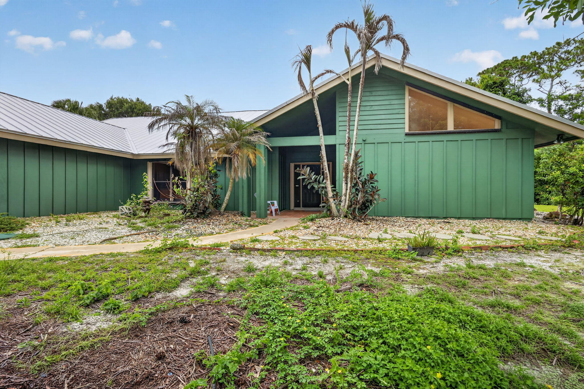 2111 Southwest Racquet Club Drive Palm City, FL 34990 - Photo 2 of 36 3-web-or-mls-5P1A7092
