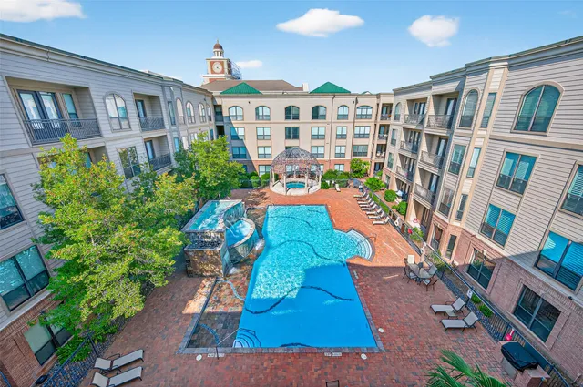 a view of pool with outdoor seating