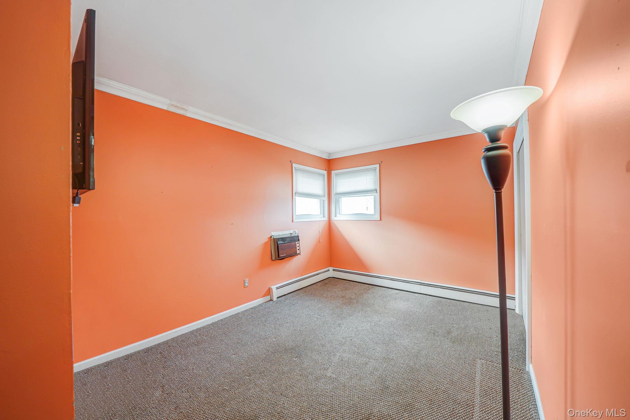 501 Windmill Avenue West Babylon, NY 11704 - Photo 20 of 35 an empty room with windows