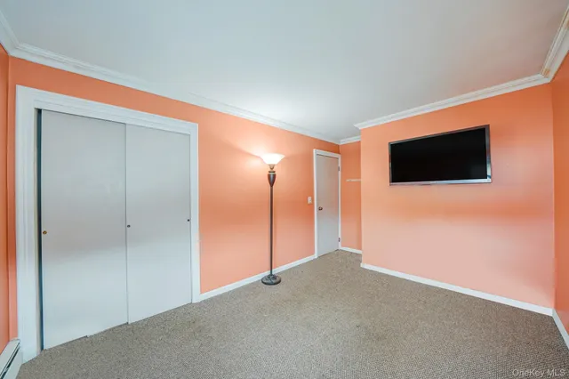 a view of a livingroom with a flat screen tv