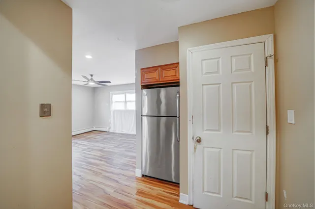 a view of a livingroom with wooden floor