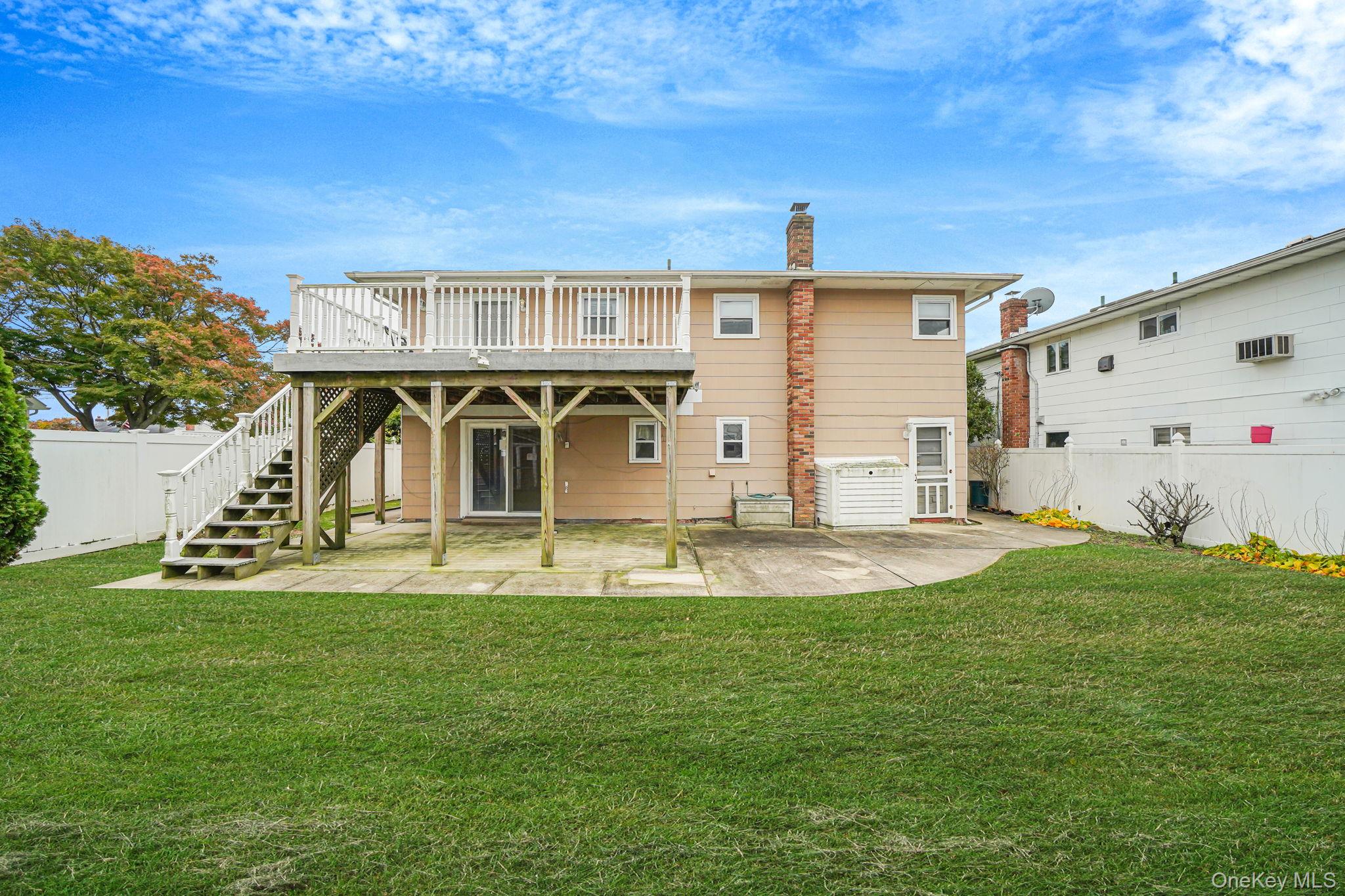 501 Windmill Avenue West Babylon, NY 11704 - Photo 5 of 35 a view of a house with a big yard