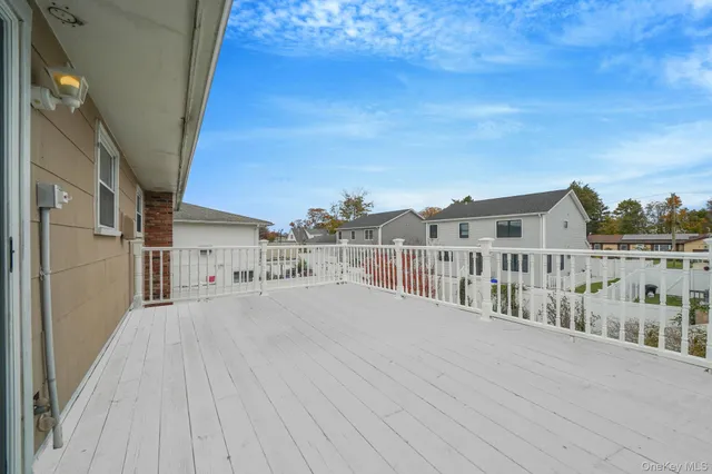 a view of a house with a roof deck