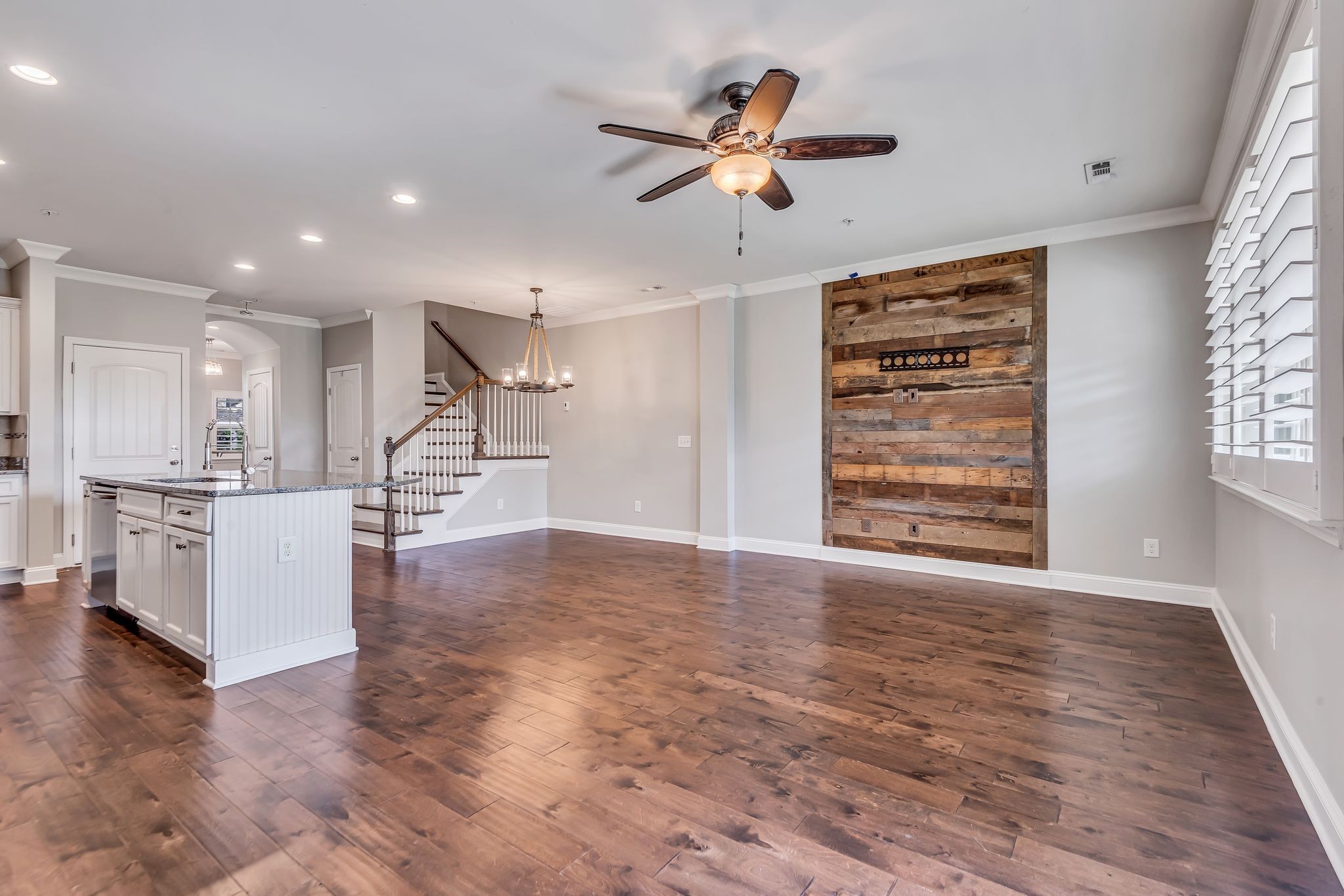 1477 Channing Drive Thompson's Station, TN 37179 - Photo 18 of 33 a view of an empty room with a window and wooden floor