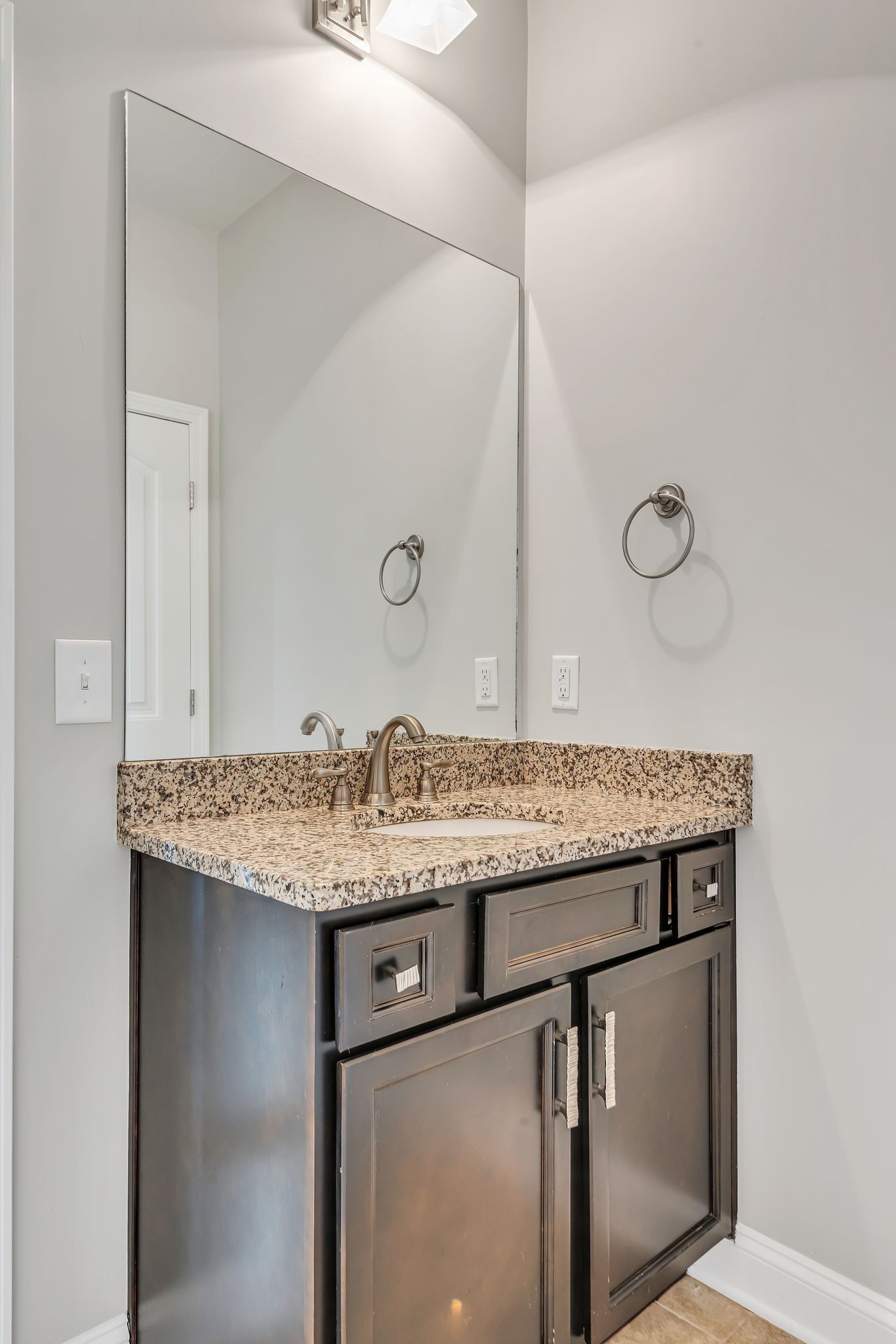 1477 Channing Drive Thompson's Station, TN 37179 - Photo 24 of 33 a sink sitting next to a bathroom sink