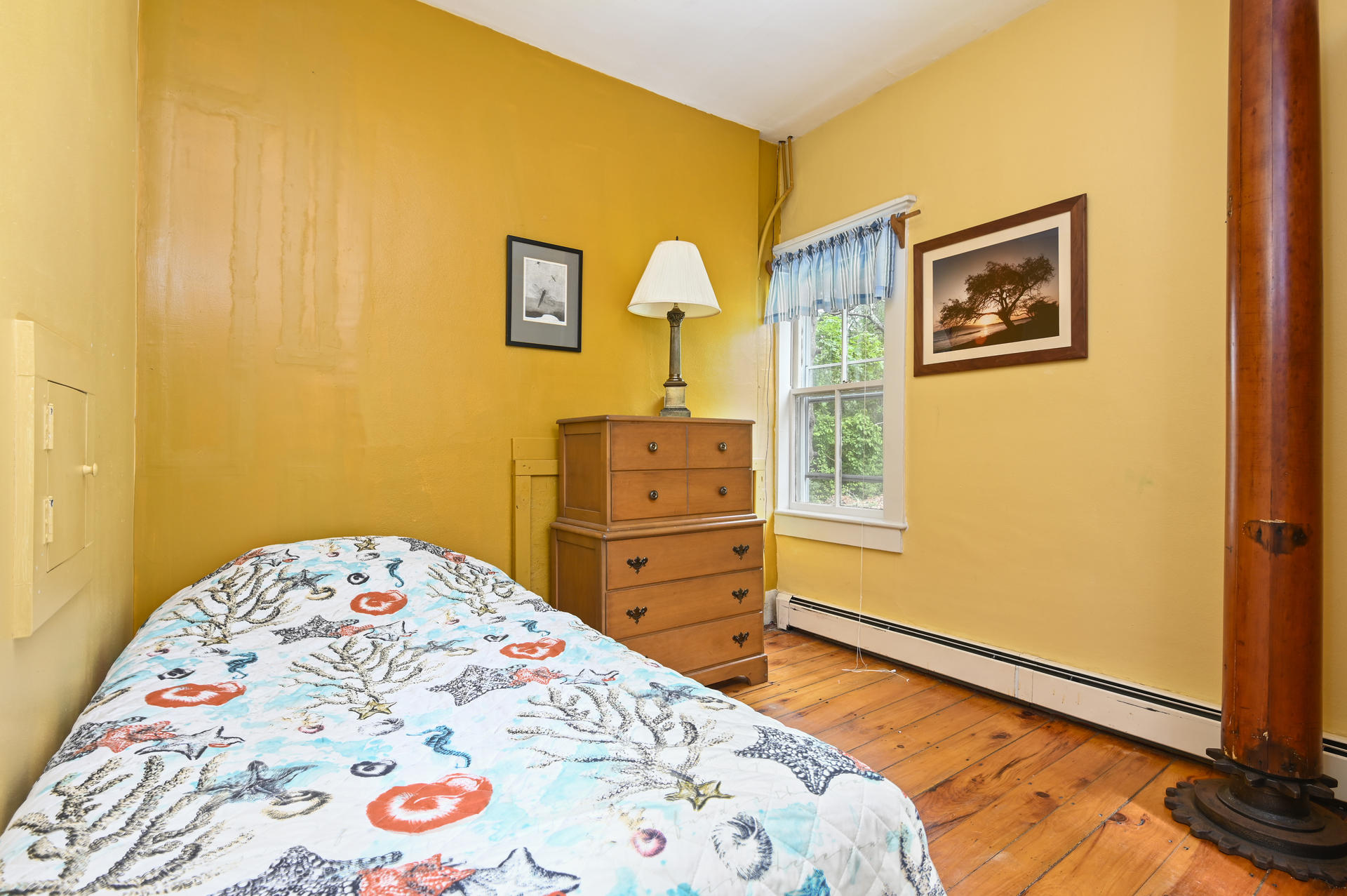 56 Depot Road Harwich, MA 02671 - Photo 7 of 25 a bedroom with a bed and a dresser