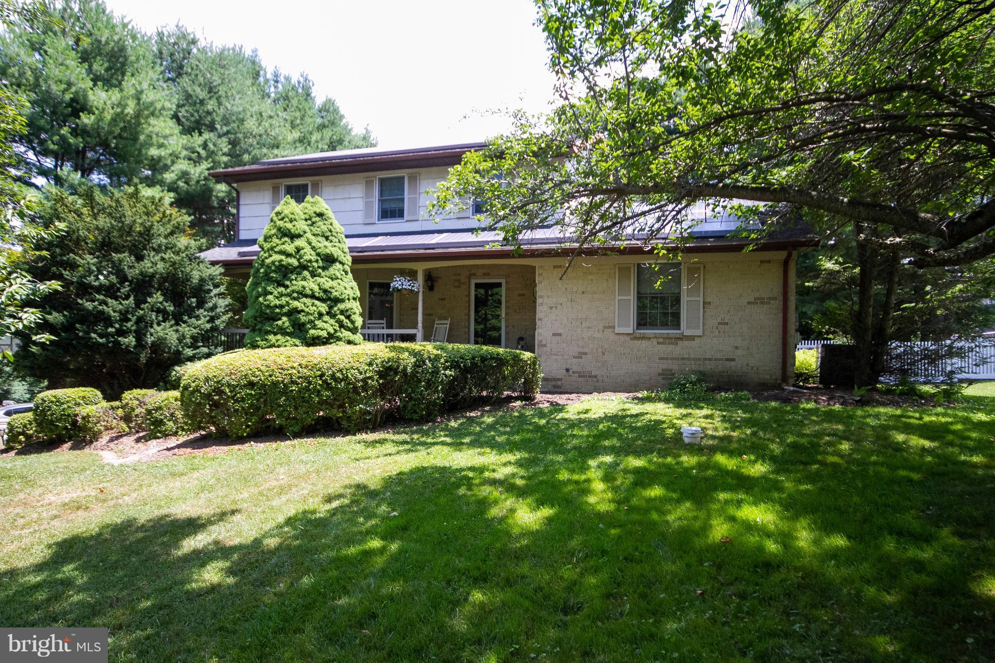 1907 Springview Court Fallston, MD 21047 - Photo 1 of 30 a view of backyard with potted plants and large tree