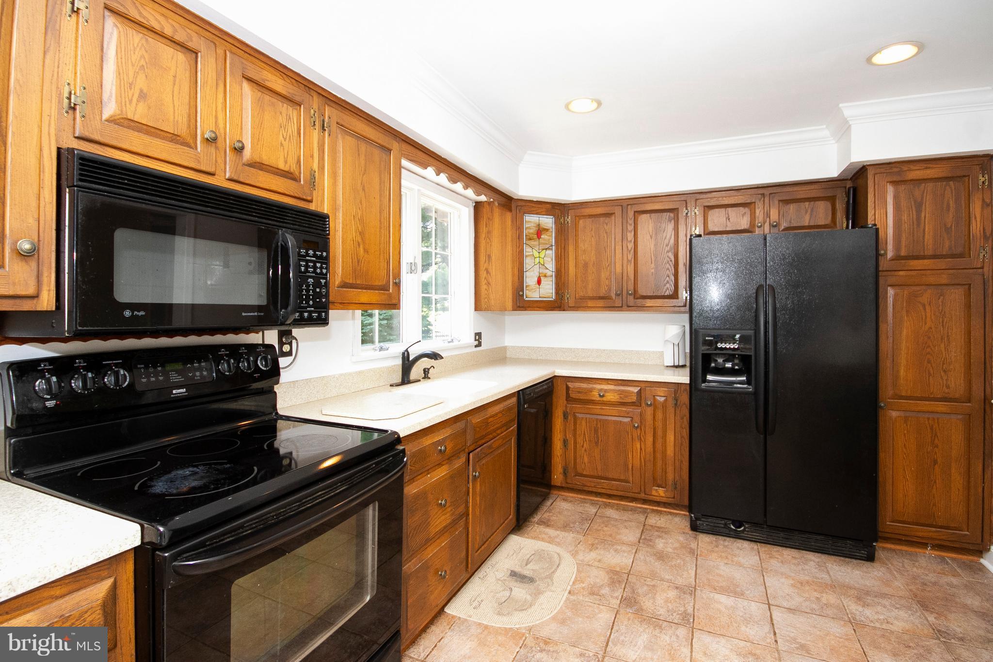 1907 Springview Court Fallston, MD 21047 - Photo 12 of 30 a kitchen with a refrigerator stove and sink