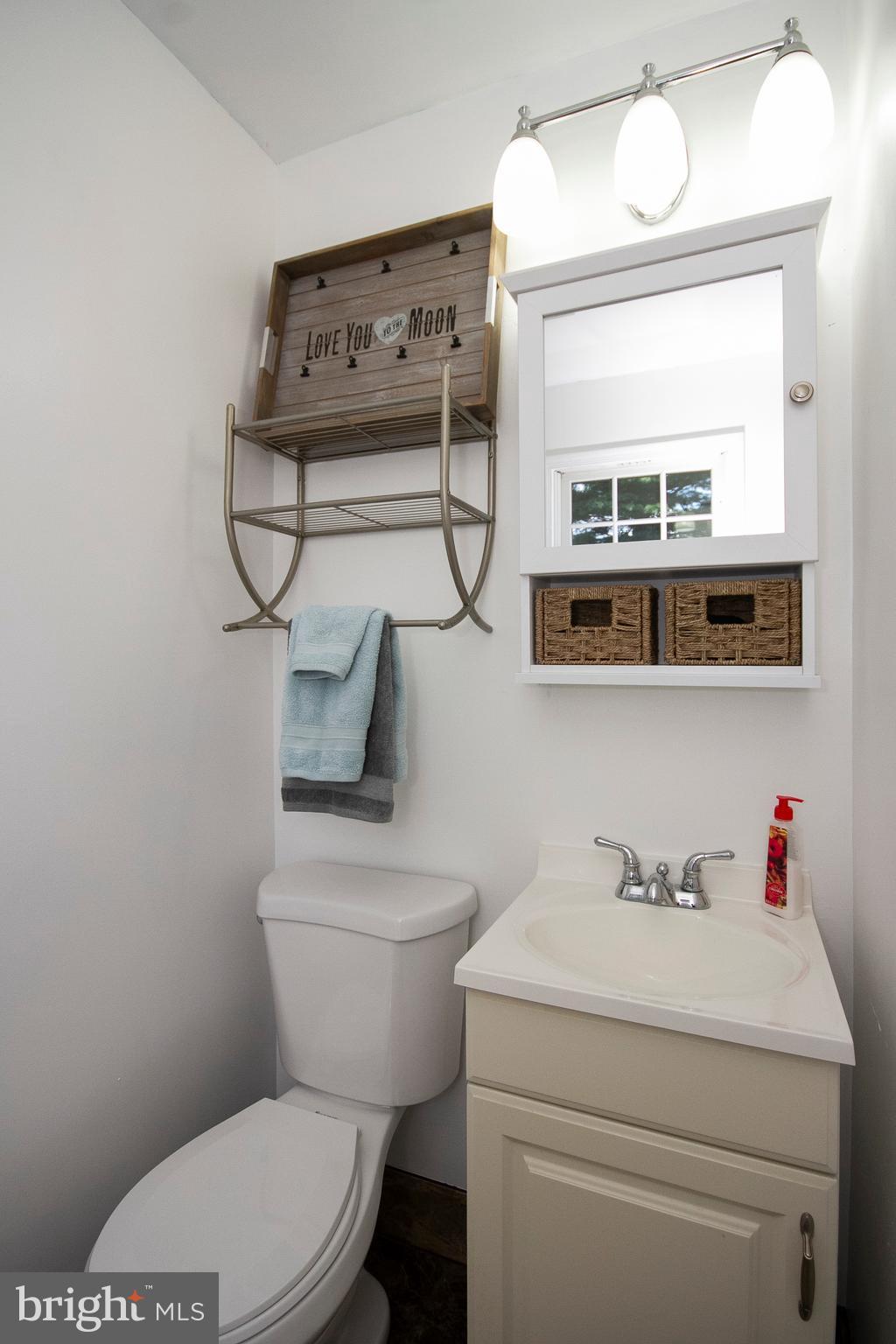 1907 Springview Court Fallston, MD 21047 - Photo 19 of 30 a bathroom with a toilet sink and mirror
