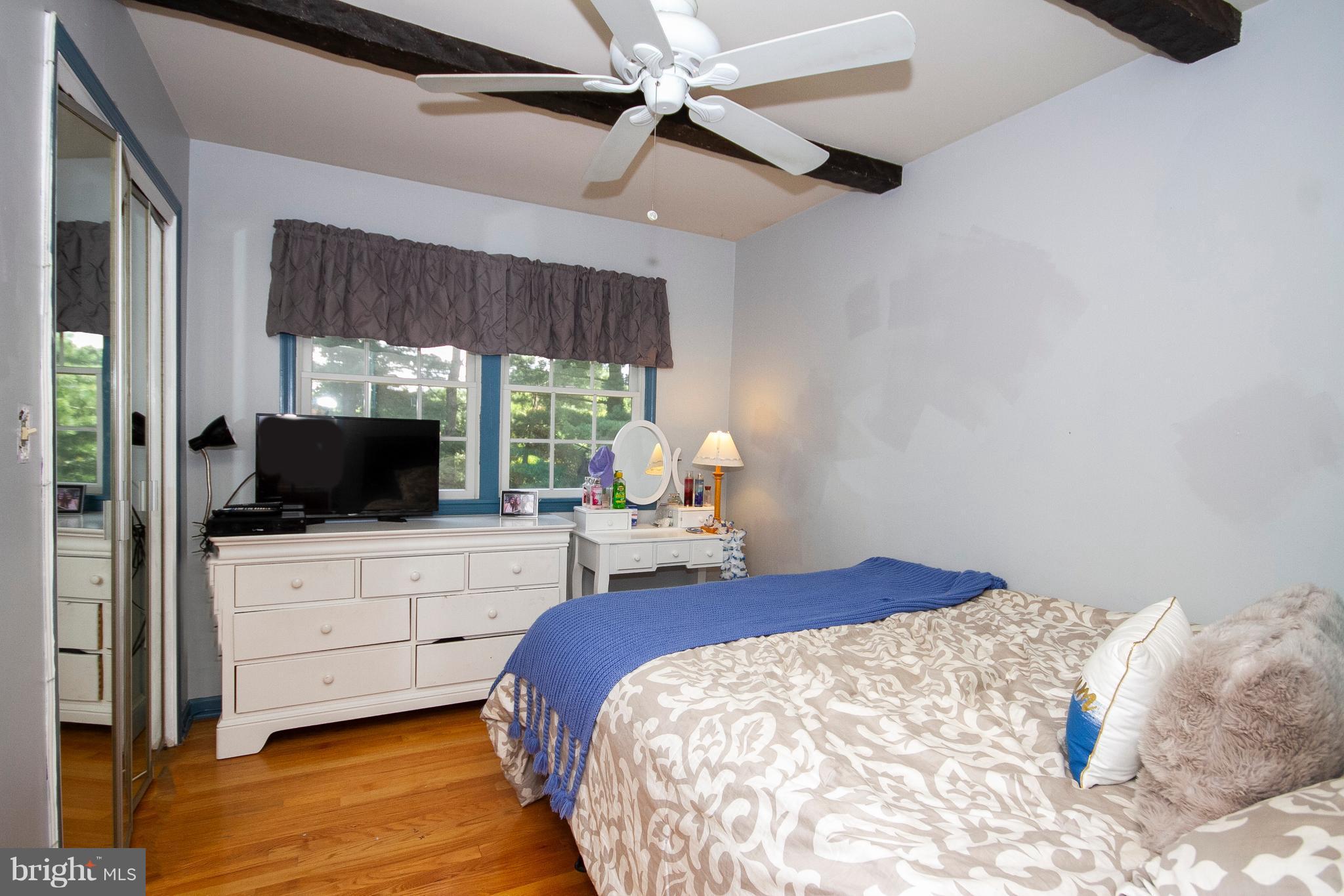 1907 Springview Court Fallston, MD 21047 - Photo 20 of 30 a bedroom with a bed and flat screen tv