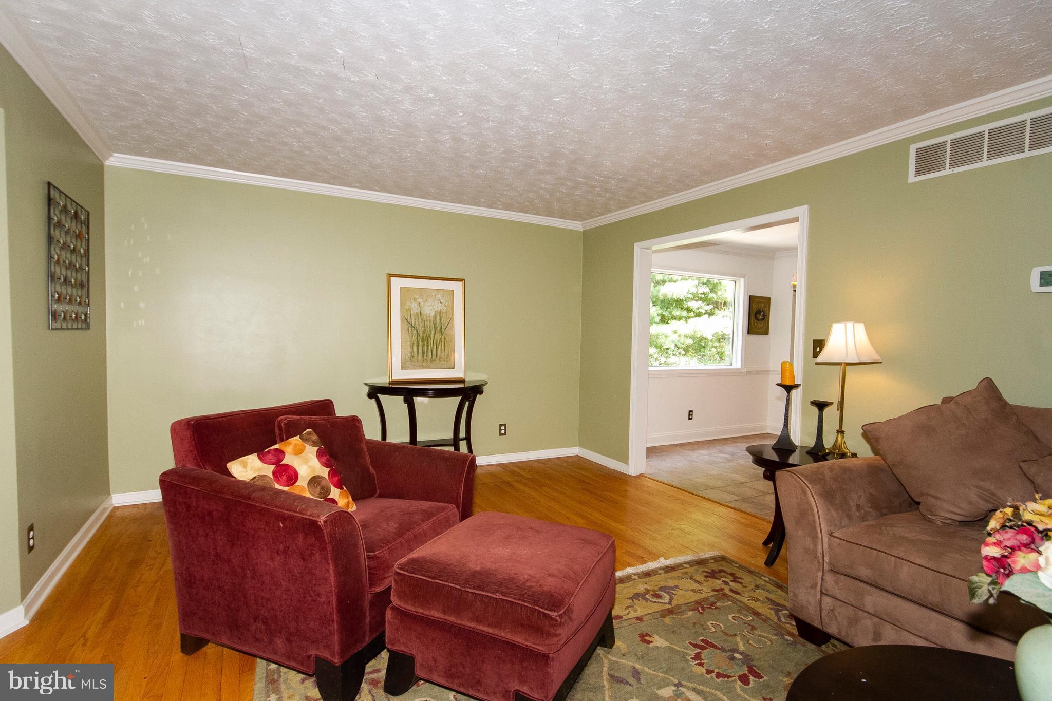 1907 Springview Court Fallston, MD 21047 - Photo 6 of 30 a bedroom with a bed and wooden floor