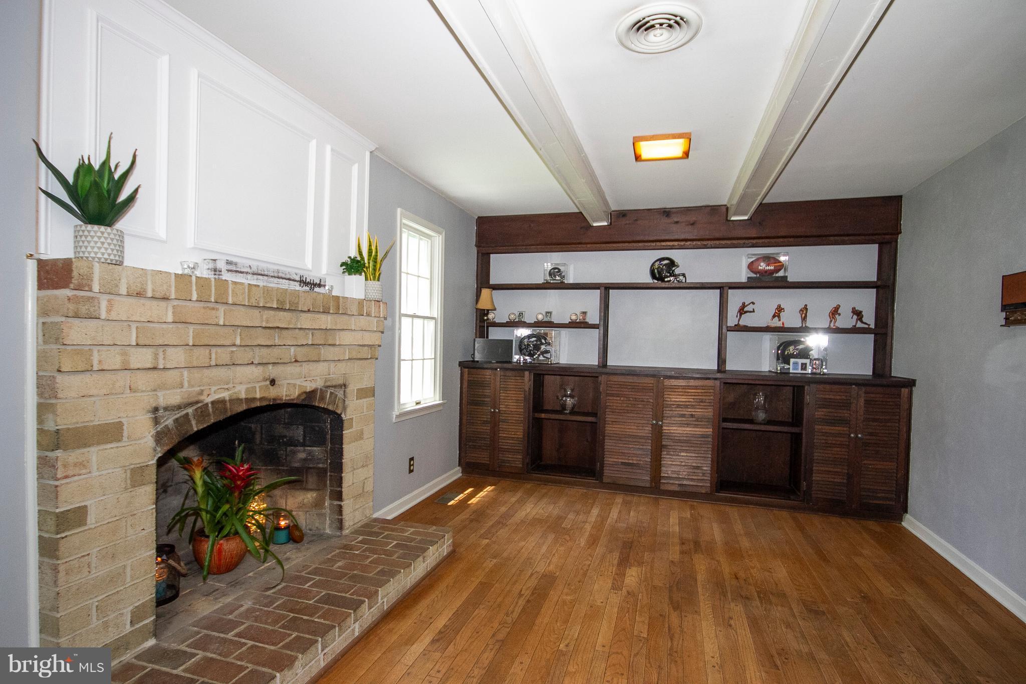 1907 Springview Court Fallston, MD 21047 - Photo 10 of 30 a room with furniture and a fireplace