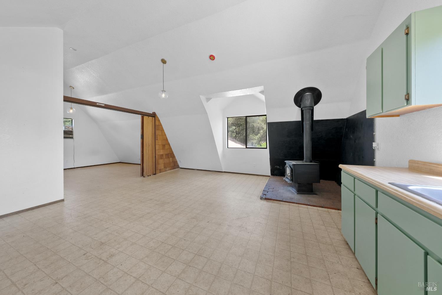 17651 Van Arsdale Road Potter Valley, CA 95469 - Photo 46 of 92 a view of a kitchen with a sink and a window