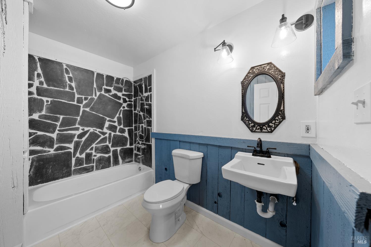 17651 Van Arsdale Road Potter Valley, CA 95469 - Photo 66 of 92 a bathroom with a sink a toilet and shower