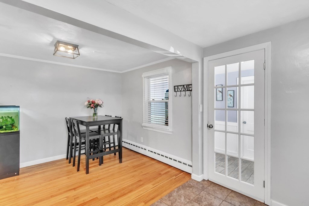 140 Talbot Road Springfield, MA 01119 - Photo 7 of 41 a dining room with wooden floor and a window