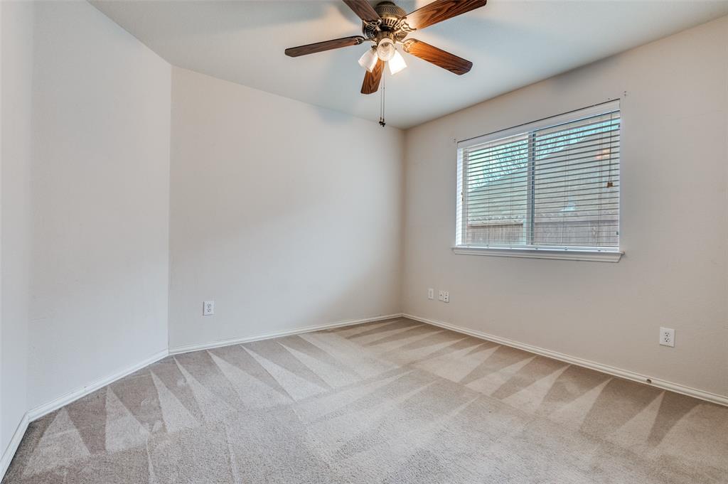 8530 Quicksilver Drive Dallas, TX 75249 - Photo 10 of 25 a view of an empty room with a window