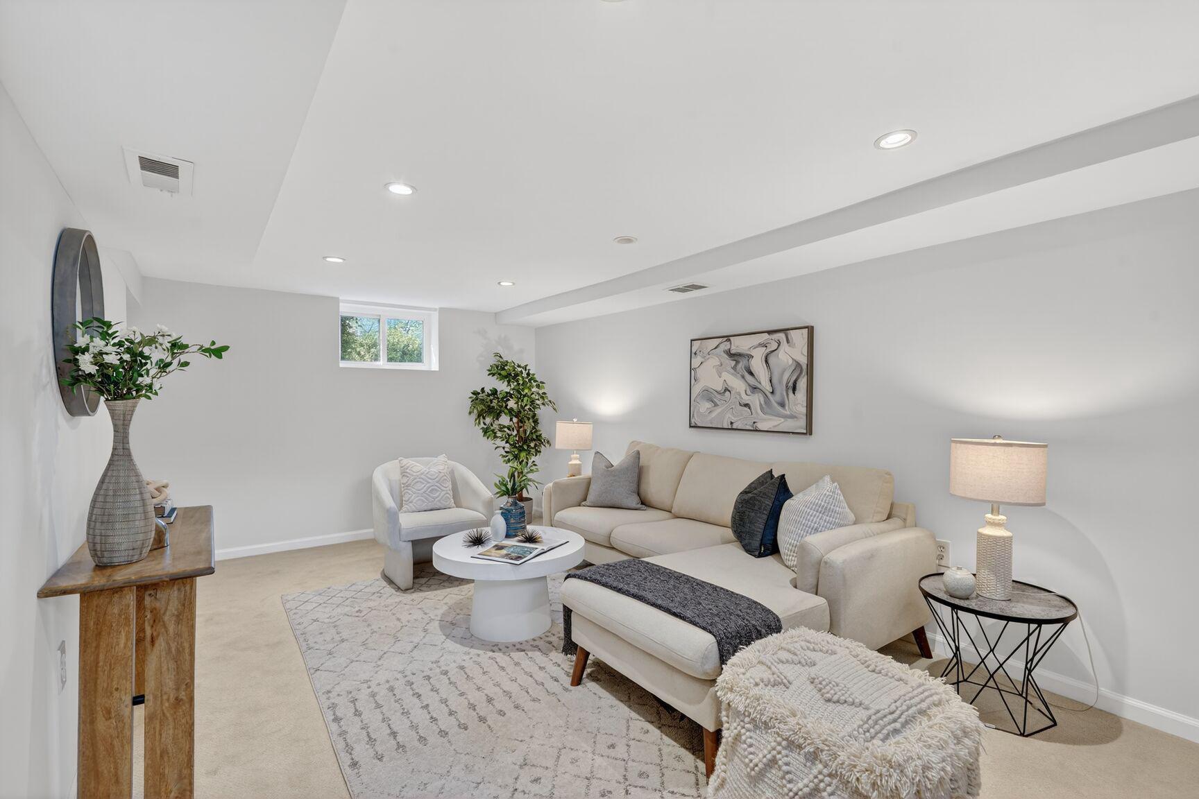 10015 Markham Street Silver Spring, MD 20901 - Photo 21 of 31 a living room with furniture and a potted plant