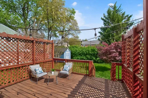 a view of a chairs on the roof deck