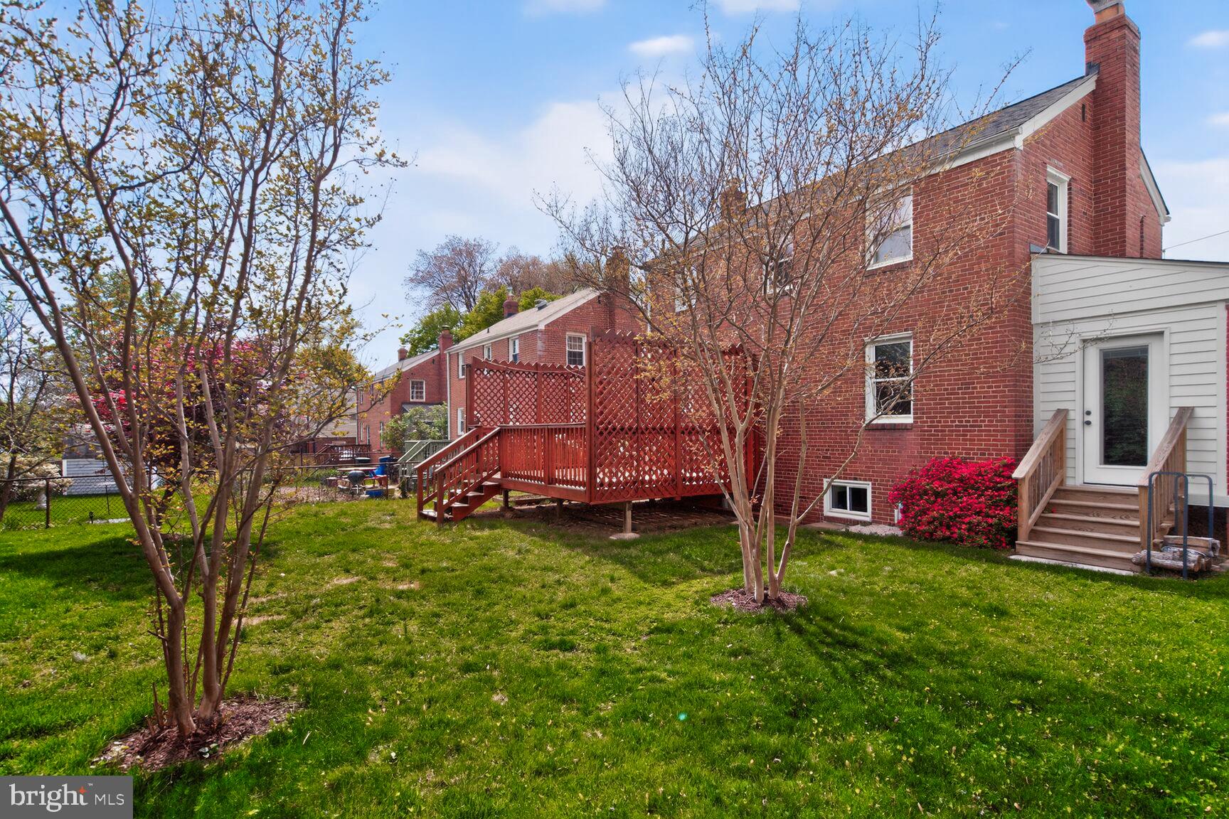 10015 Markham Street Silver Spring, MD 20901 - Photo 29 of 31 a view of a house with a yard