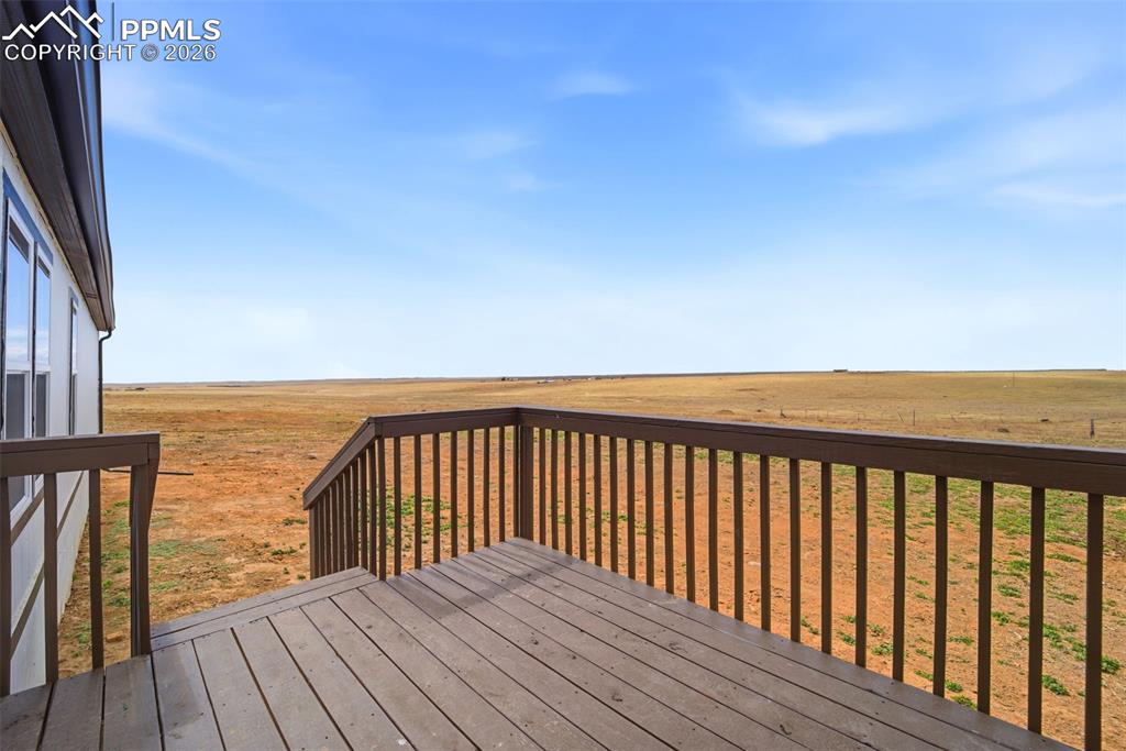 35125 Book Road Yoder, CO 80864 - Photo 43 of 45 a view of balcony with wooden floor