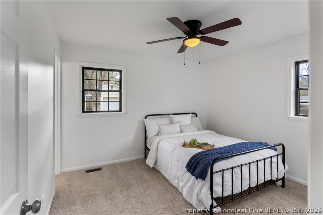 742 Newport Road Fayetteville, NC 28314 - Photo 26 of 47 Primary Bedroom - New Fan/Light Combo, Carpet, and Paint