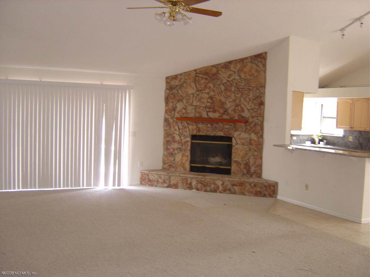 8343 Chason Road East Jacksonville, FL 32244 - Photo 2 of 6 Living rm w/ Stone fireplace