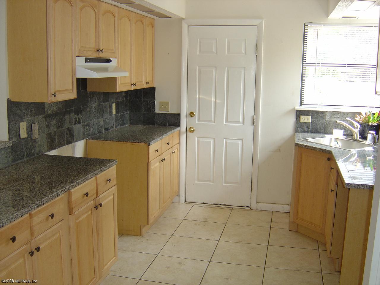 8343 Chason Road East Jacksonville, FL 32244 - Photo 3 of 6 Kitchen w/ new cabinets and granite coun