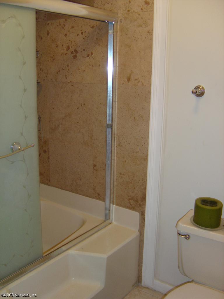 8343 Chason Road East Jacksonville, FL 32244 - Photo 6 of 6 Master shower w/ stone tile surround