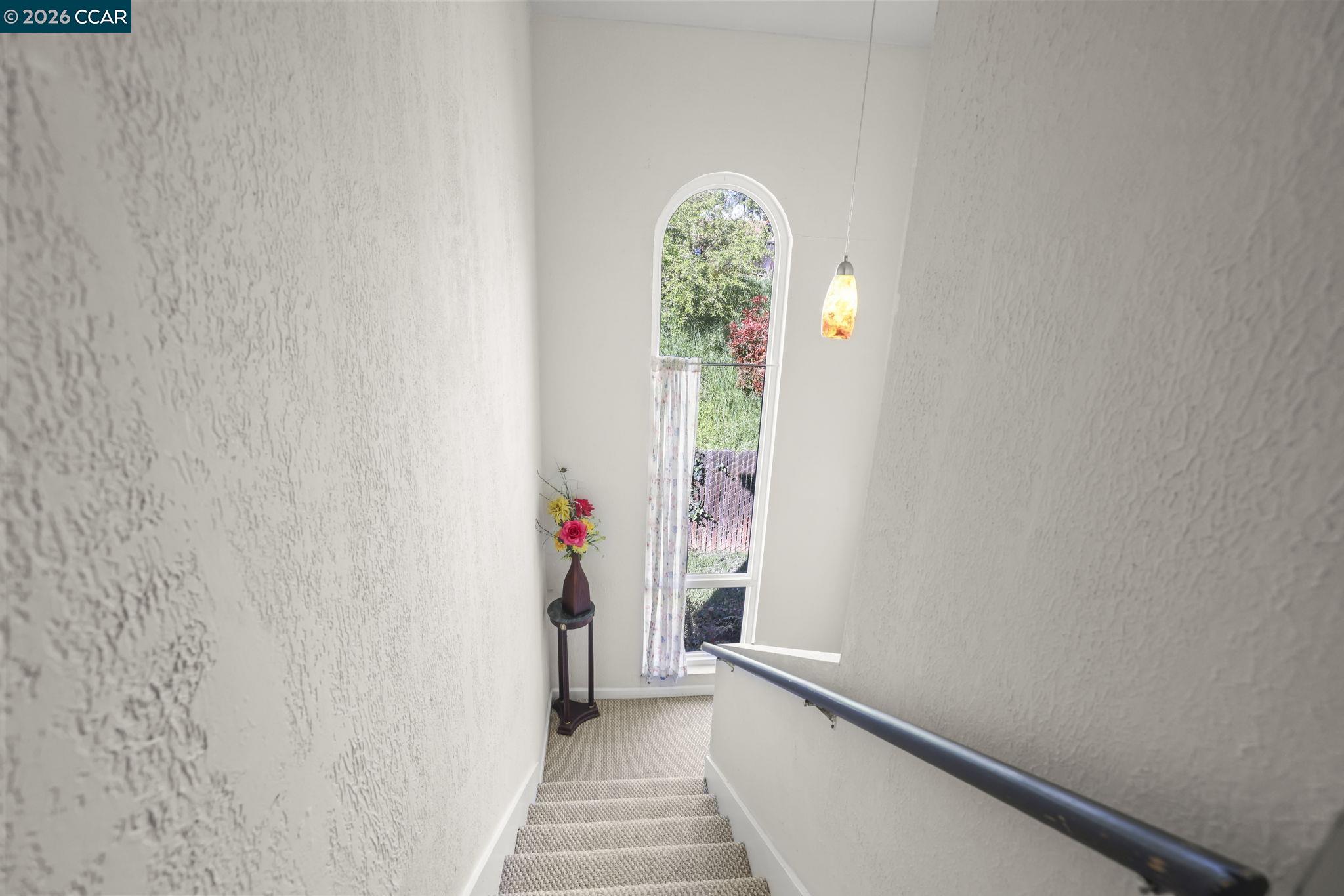 61 Meadowbrook Circle Pittsburg, CA 94565 - Photo 14 of 24 a view of a hallway with wooden floor and a bathroom
