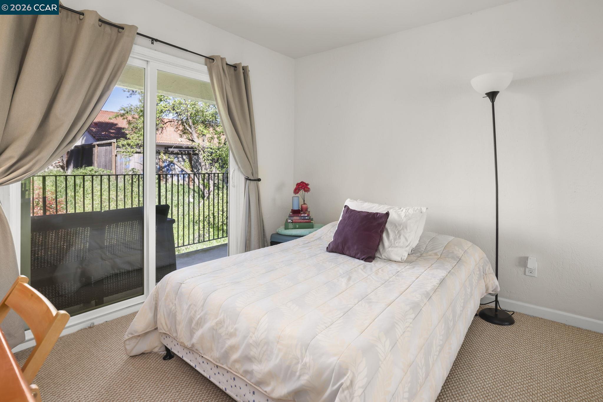 61 Meadowbrook Circle Pittsburg, CA 94565 - Photo 18 of 24 a bedroom with a bed and a window