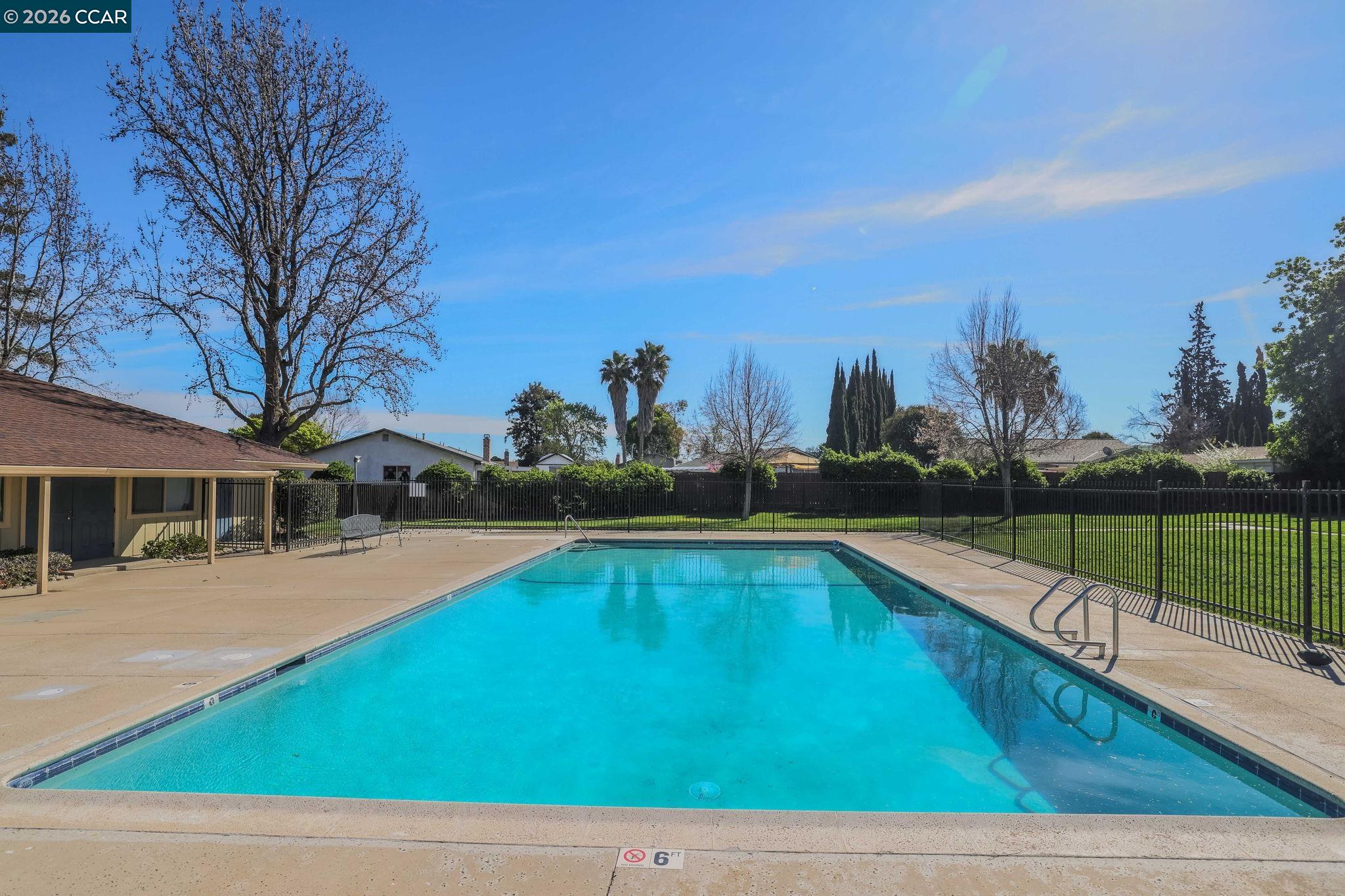 61 Meadowbrook Circle Pittsburg, CA 94565 - Photo 23 of 24 a view of a house with swimming pool