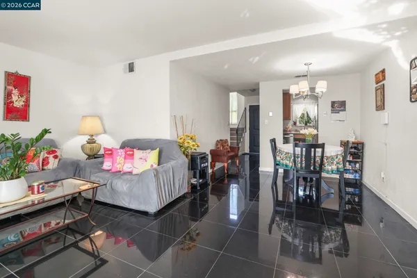 a bedroom with furniture and a dining table
