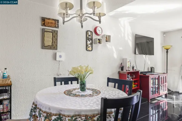 a view of a dining room with furniture