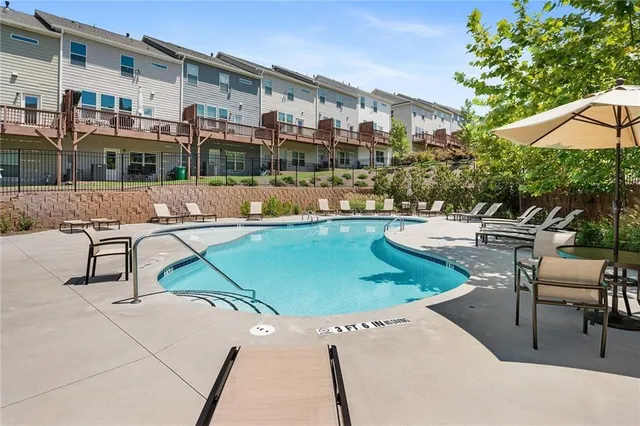 a view of an chairs and tables in the patio