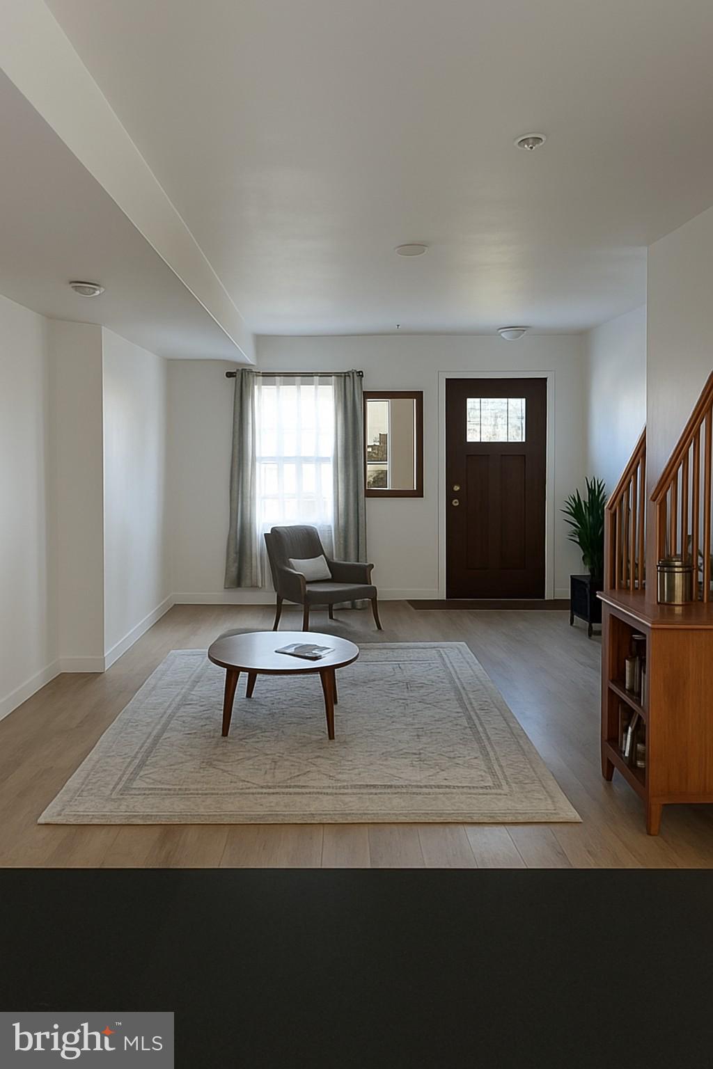 22 West 7th Street Frederick, MD 21701 - Photo 4 of 12 a living room with furniture and a rug