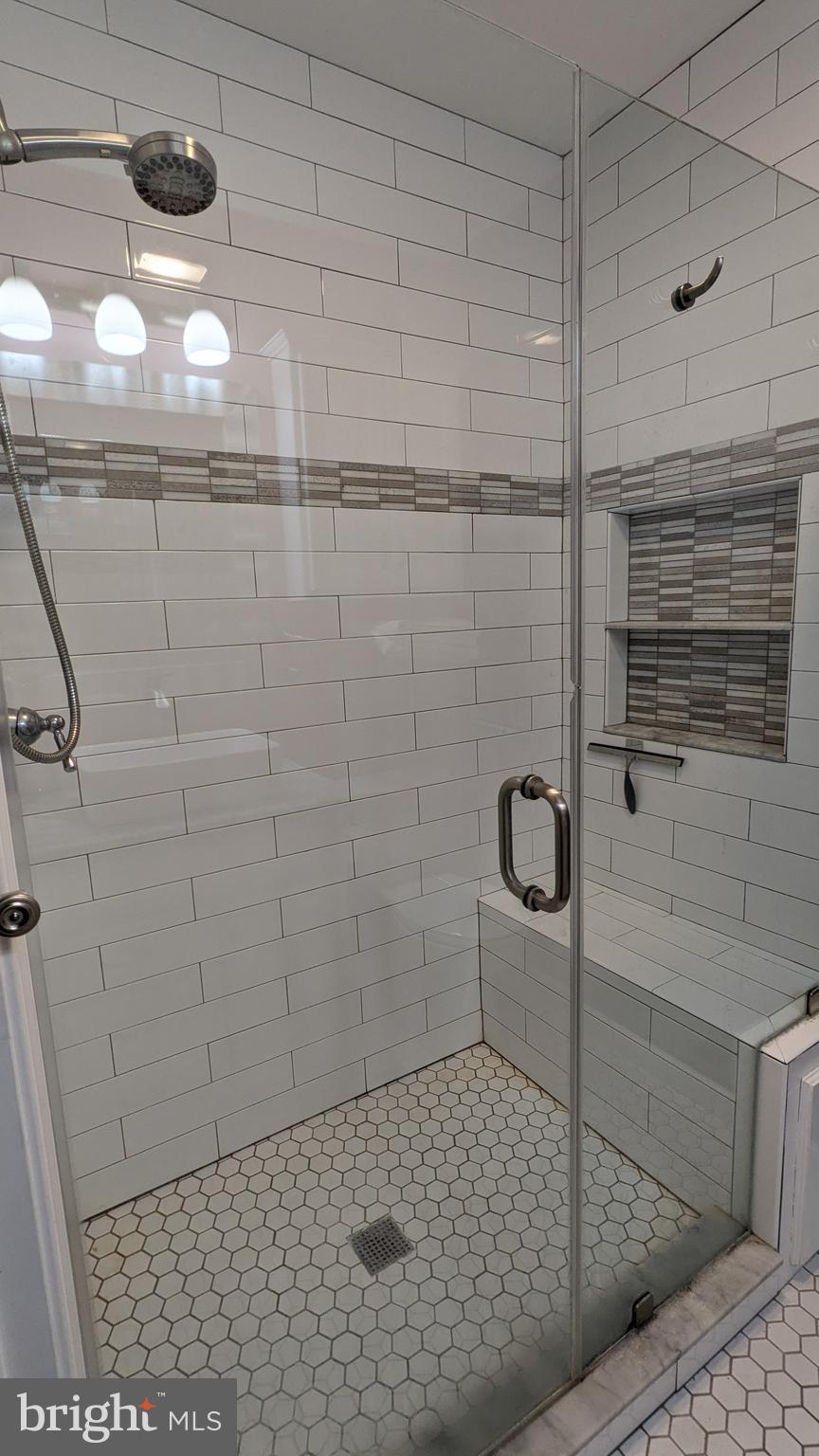 22 West 7th Street Frederick, MD 21701 - Photo 8 of 12 a bathroom with a shower