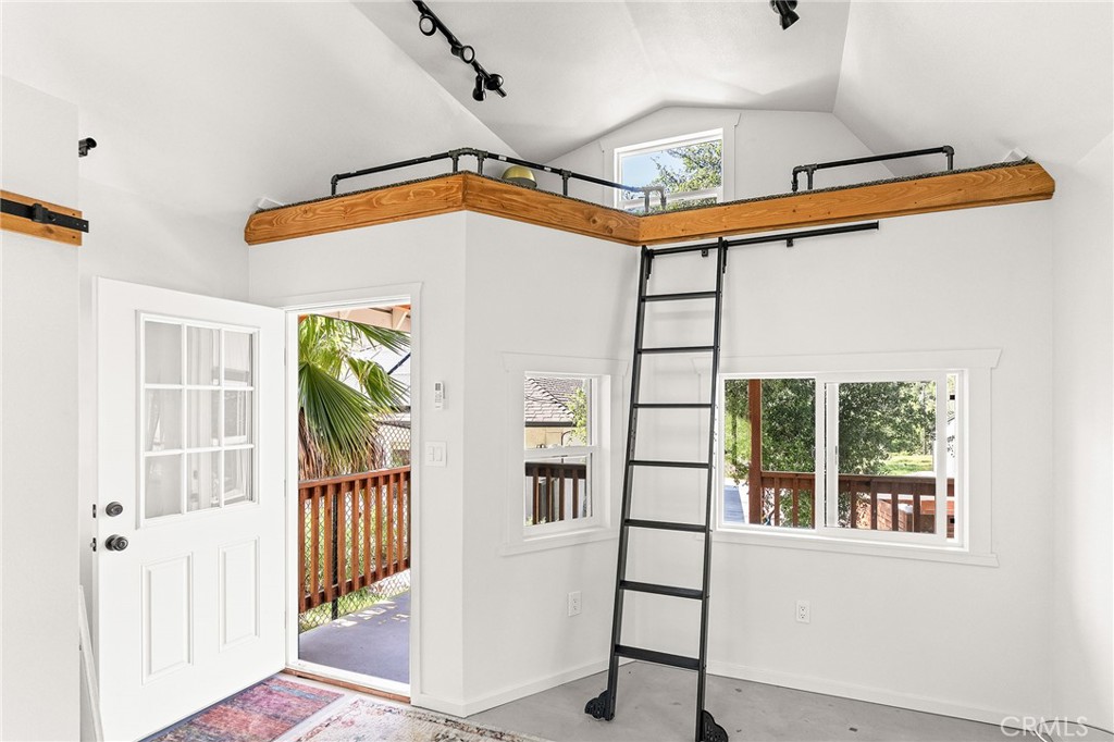 2262 Honey Run Road Chico, CA 95928 - Photo 33 of 74 A detached, fully finished studio offers flexible space for an office, art studio, or guest overflow—complete with a loft, closet, and mini-split system.