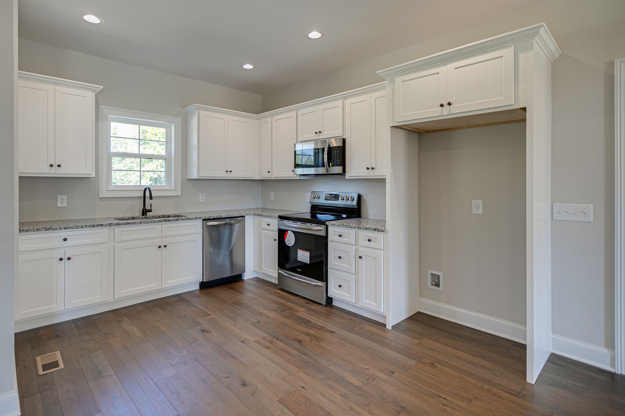 4640 Lunns Store Road Chapel Hill, TN 37034 - Photo 11 of 30 a kitchen with granite countertop white cabinets and white appliances