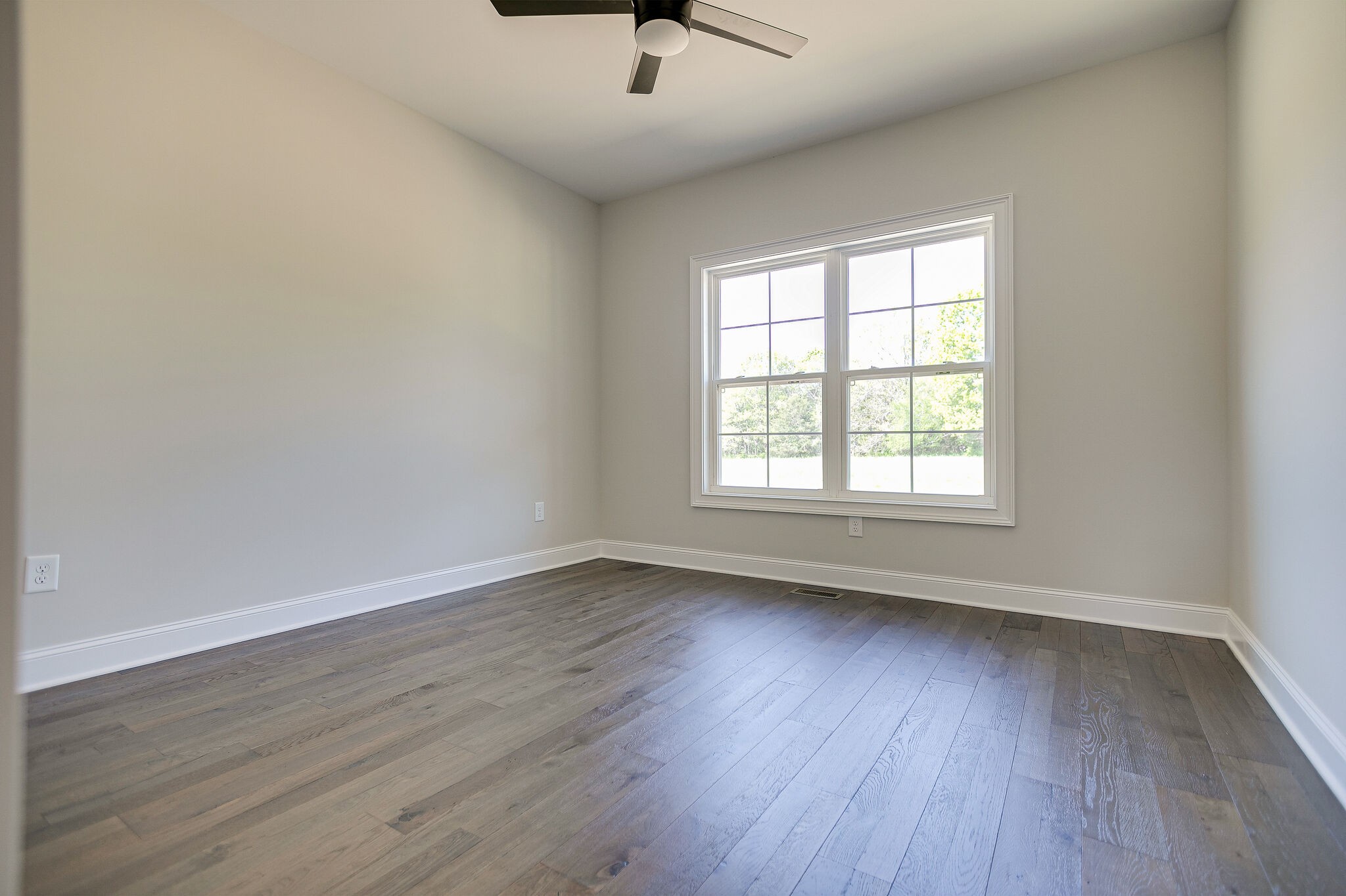 4640 Lunns Store Road Chapel Hill, TN 37034 - Photo 19 of 30 an empty room with wooden floor and windows