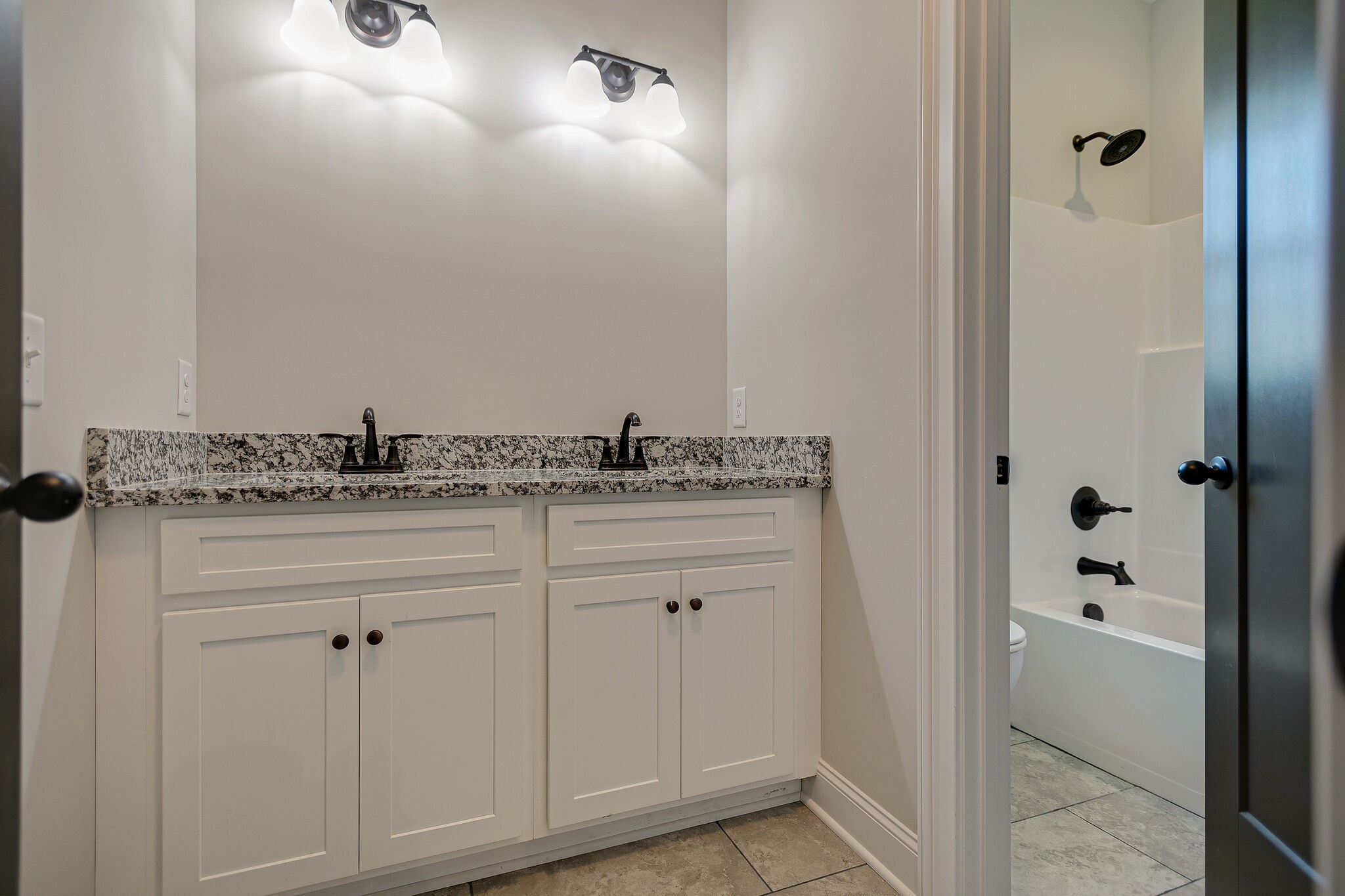 4640 Lunns Store Road Chapel Hill, TN 37034 - Photo 20 of 30 a bathroom with a granite countertop sink and mirror