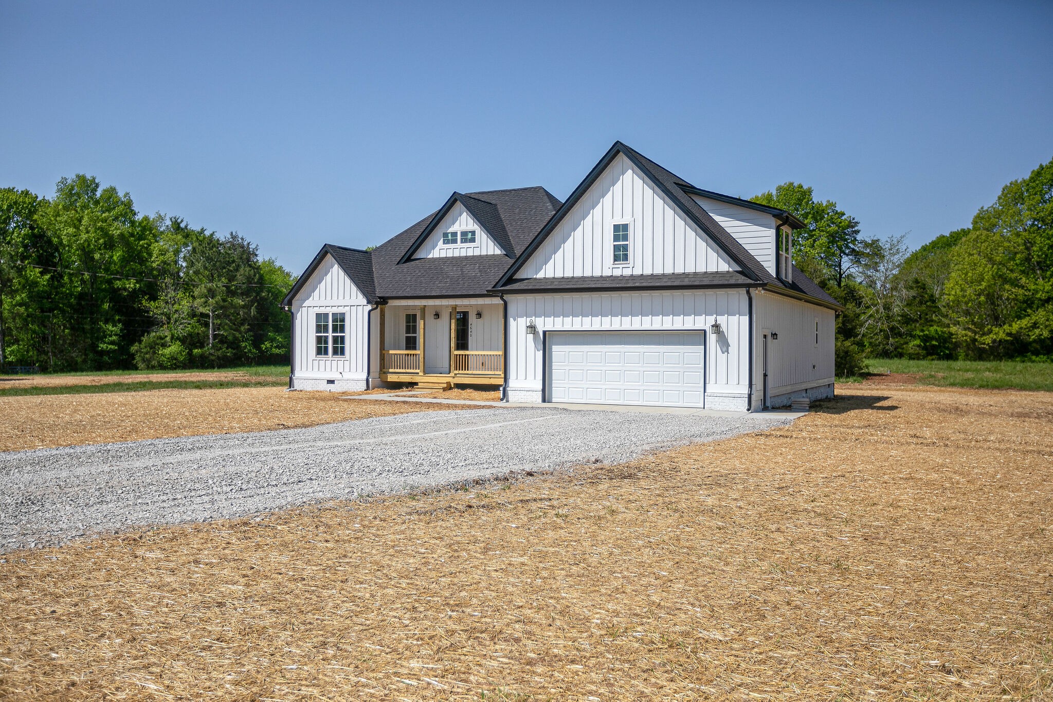 4640 Lunns Store Road Chapel Hill, TN 37034 - Photo 2 of 30 a front view of a house with a yard and garage